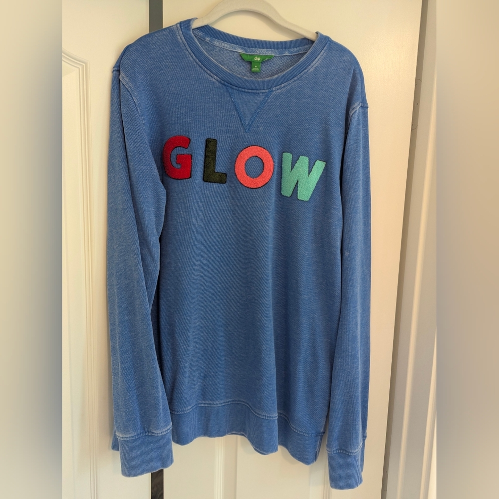 Dip Blue Sweatshirt with Vibrant Lettering